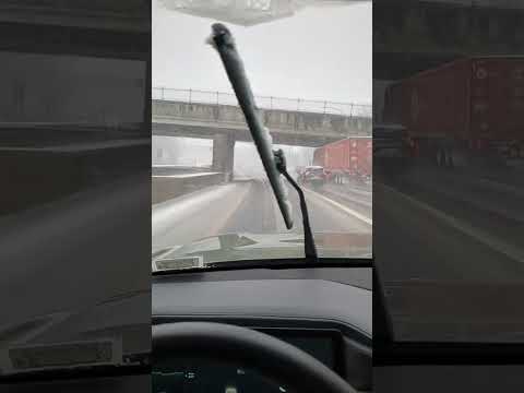 Rivian driving in the snow storm New York.